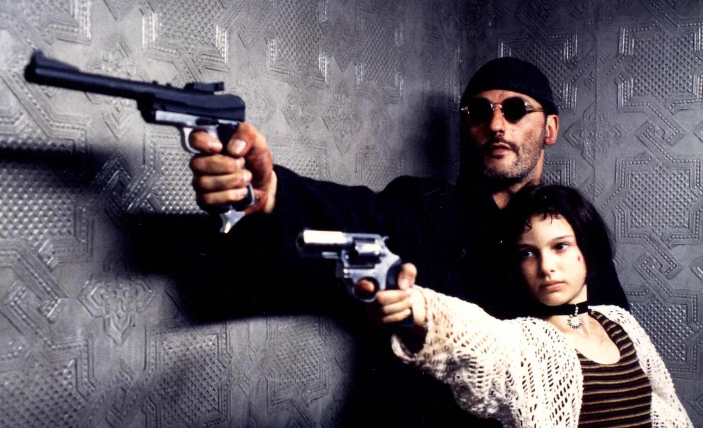 "Leon: The Professional" "Luc Besson" "Cinematic Masterpiece" "Natalie Portman Debut" "Hitman Thriller"