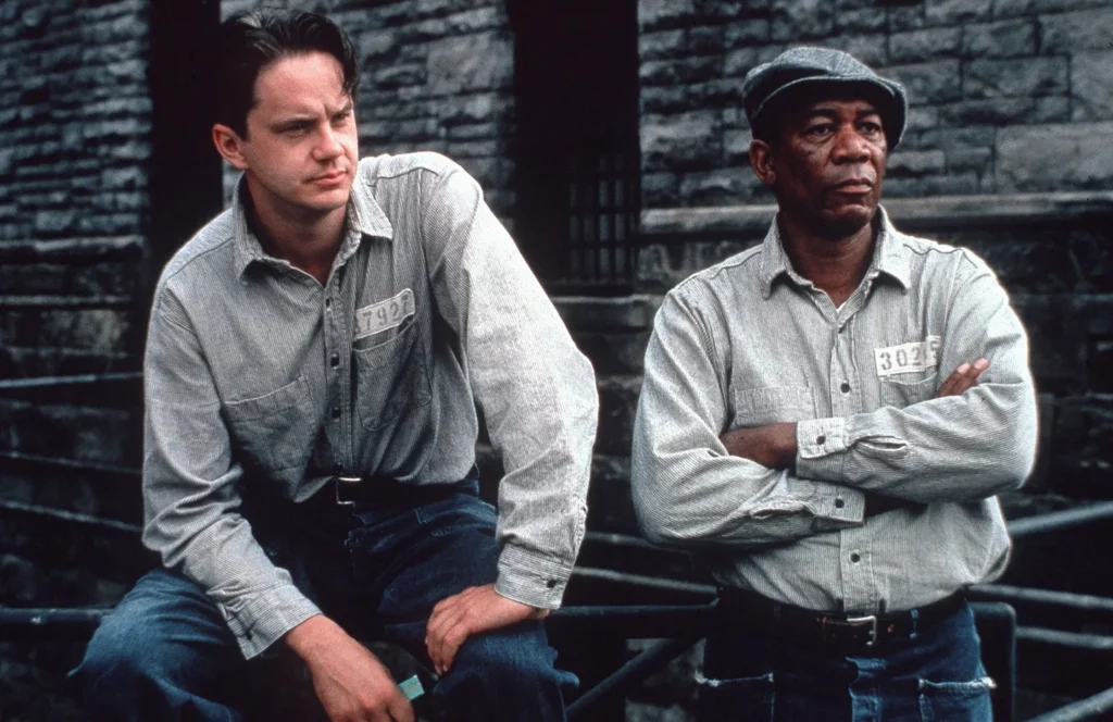 "Top 5 IMDb Movies of All Time" featuring The Shawshank Redemption and other cinematic masterpieces that shaped film history.